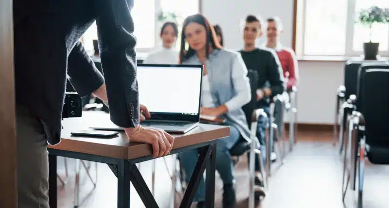 using laptop group people business conference modern classroom daytime 1